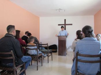 Kujtim preaching in Sukth