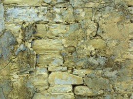 an-old-stone-wall-with-crumbling-plaster1