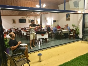 Tim playing violin at Paradosi